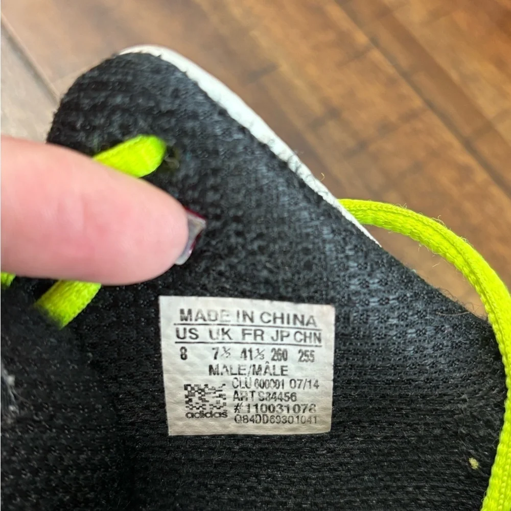 Adidas Black and White Sneakers with Neon Green Laces